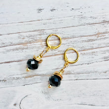 Load image into Gallery viewer, Black Faceted Bead Huggie Earrings on Gold Plated Ear Wire