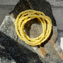 Load image into Gallery viewer, Sunlit Yellow Beaded Wrap Bracelet with Golden Tassel Accent