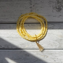 Load image into Gallery viewer, Sunlit Yellow Beaded Wrap Bracelet with Golden Tassel Accent