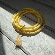 Load image into Gallery viewer, Sunlit Yellow Beaded Wrap Bracelet with Golden Tassel Accent