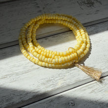 Load image into Gallery viewer, Sunlit Yellow Beaded Wrap Bracelet with Golden Tassel Accent