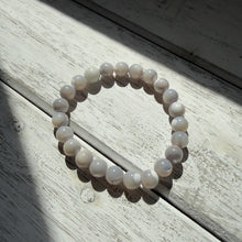 Load image into Gallery viewer, Mother of Pearl Stretch Bracelet – Iridescent Glow &amp; Timeless Elegance