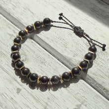 Load image into Gallery viewer, Black Onyx &amp; Gold-Plated Hematite Adjustable Bracelet on Waxed Cord