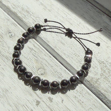 Load image into Gallery viewer, Black Onyx &amp; Silver-Plated Hematite Adjustable Bracelet on Waxed Cord