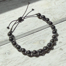 Load image into Gallery viewer, Black Onyx &amp; Silver-Plated Hematite Adjustable Bracelet on Waxed Cord