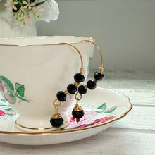 Load image into Gallery viewer, Hand-Formed Gold Plated Earrings with Black Faceted Beads