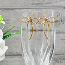 Load image into Gallery viewer, Gold Bow Dangle Earrings